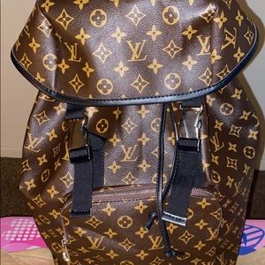 Louis Vuitton buckle strap backpack
